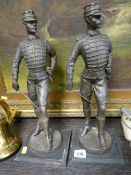 Pair of bronze figures on square plinths of military men