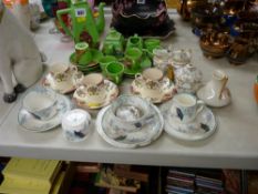 Japanese 'Samurai' hand painted coffee set, three floral decorated coffee cups and saucers and a