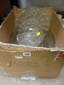 Box of heavy mixed glassware, table doilies etc