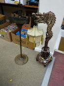 Wooden carved dragon table lamp and a longboat smoker's companion