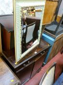Modern inlaid side cabinet and a bevelled edge mirror