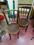 Two spindleback bentwood chairs with Mundus & J & J Kohn Ltd label