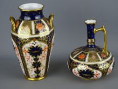 Royal Crown Derby '1128' squat jug and a twin handled segmented vase (cracked)