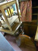 Polished wood upright storage unit of three shelves, central drawer, two base cupboards and a