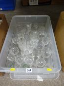 Lidded plastic crate of drinking glassware
