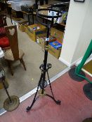Wrought iron and brass adjustable oil lamp stand