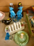 Pair of carved wooden bookends in the form of stylized birds, a Sylvac dog ashtray, a pair of