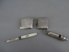 Two silver vesta cases, a silver and mother of pearl fruit knife and a base metal Acme whistle, 2.