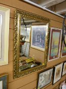 Gilt framed modern wall mirror
