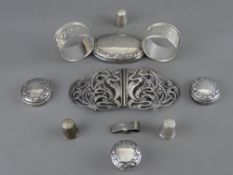 Quantity of small silver including three Charles Horner thimbles, two napkin rings, a large belt