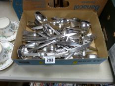 Tray containing modern cutlery