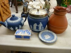 Wedgwood terracotta jug, a Jasperware biscuit barrel and teapot etc