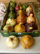 Collection of pottery sauce pots with lids including a beetroot pot and three others marked 'Sylvac'