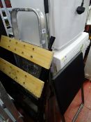 Folding metal workbench, garden rake, metal stepladder and folding table