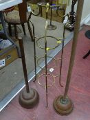 Three tier brass pan stand and two copper possers