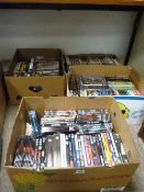 Four boxes containing very large quantity of DVDs (approx. 150-200)