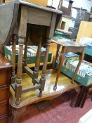 Mahogany nest of three tables with glass inserts, similar occasional table, Long John coffee table