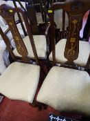 Three inlaid splatback chairs and a classical armchair