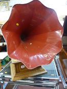 Restored oak cased HMV gramophone record player with red and white ribbed horn