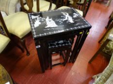 Quartetto of lacquerwork tables with mother of pearl inlay