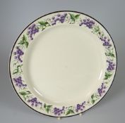 A SWANSEA CREAMWARE POTTERY PLATE the border decorated with a continuous vine of grapes and