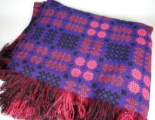 TRADITIONAL WELSH WOOL BLANKET of purple ground and having black and pink geometric patterns, 116