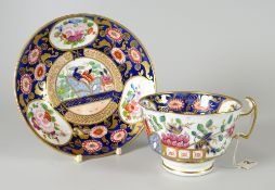 A SWANSEA PORCELAIN TEA CUP & SAUCER IN JAPAN PATTERN No. 219 with dark blue underglaze floral