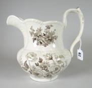 A SWANSEA POTTERY JUG WITH FLORAL TRANSFER having a moulded body with sepia transfer mark 'Opaque