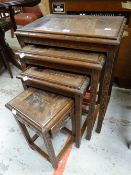 A nest of three carved Oriental-type tables Condition reports provided on request by email for