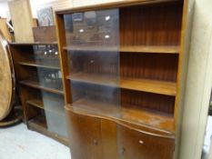 A polished bookcase with cupboard base and a sliding door vintage bookcase Condition reports