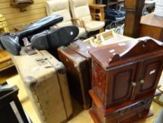 Two items of vintage luggage, a vintage table-top cabinet and a pair of riding boots Condition
