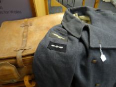 RAF overcoat in a vintage leather suitcase Condition reports provided on request by email for this