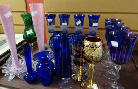 A tray of blue and other coloured drinking glasses ETC Condition reports provided on request by