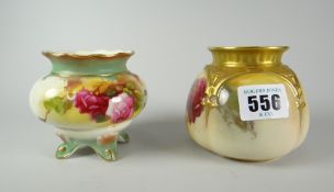 Two Royal Worcester pot-pourri vases (without covers), one raised on four feet and the other of