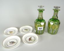 A pair of good antique oil bottles of fluted form and with tinted green glass and gilt vine