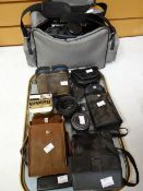 Parcel of vintage cameras including a cased Contax, camera equipment, binoculars ETC Condition
