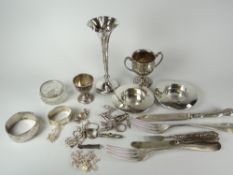 A tin of mixed silver including trumpet vase and jewellery Condition reports provided on request
