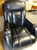 A black leather electric recliner armchair Condition reports provided on request by email for this