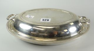 Silver oval entree dish, the lid with two handles, Sheffield hallmarks, maker Walker & Hall, 33 troy