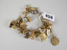 9ct gold ladies charm bracelet with over thirty charms, mostly 9ct gold, 58.6grams overall including