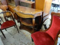 Two velvet covered antique chairs together with a mahogany three-tier console table Condition