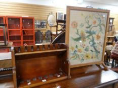 A mahogany stand (possibly for pipes) and a vintage floral embroidered fire-screen Condition reports