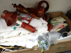 Two boxes of miscellaneous items including table linen, decorative wall lights, kitchen items ETC