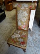 Nineteenth century prie-dieu chair covered in floral needlework upholstery Condition reports