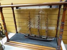 Cased three-masted model ship with paperwork (ship 53 x 79cms, case 68 x 98cms) Condition reports