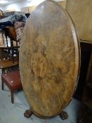 A walnut tilt-top antique breakfast table on claw supports (distressed) Condition reports provided