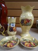 Four items of Aynsley 'Orchard Gold', two vases and two coasters Condition reports provided on