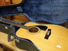 A good cased Yamaha acoustic guitar Condition reports provided on request by email for this