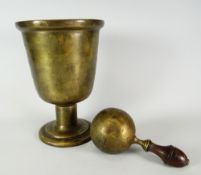 An exotic polished (believed bronze) Tibetan prayer-bell and ball-type clanger with wooden handle,