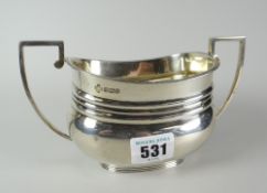 Solid silver twin handled sucrier of ribbed design, Sheffield hallmarked, makers mark RJCA Ltd, 8